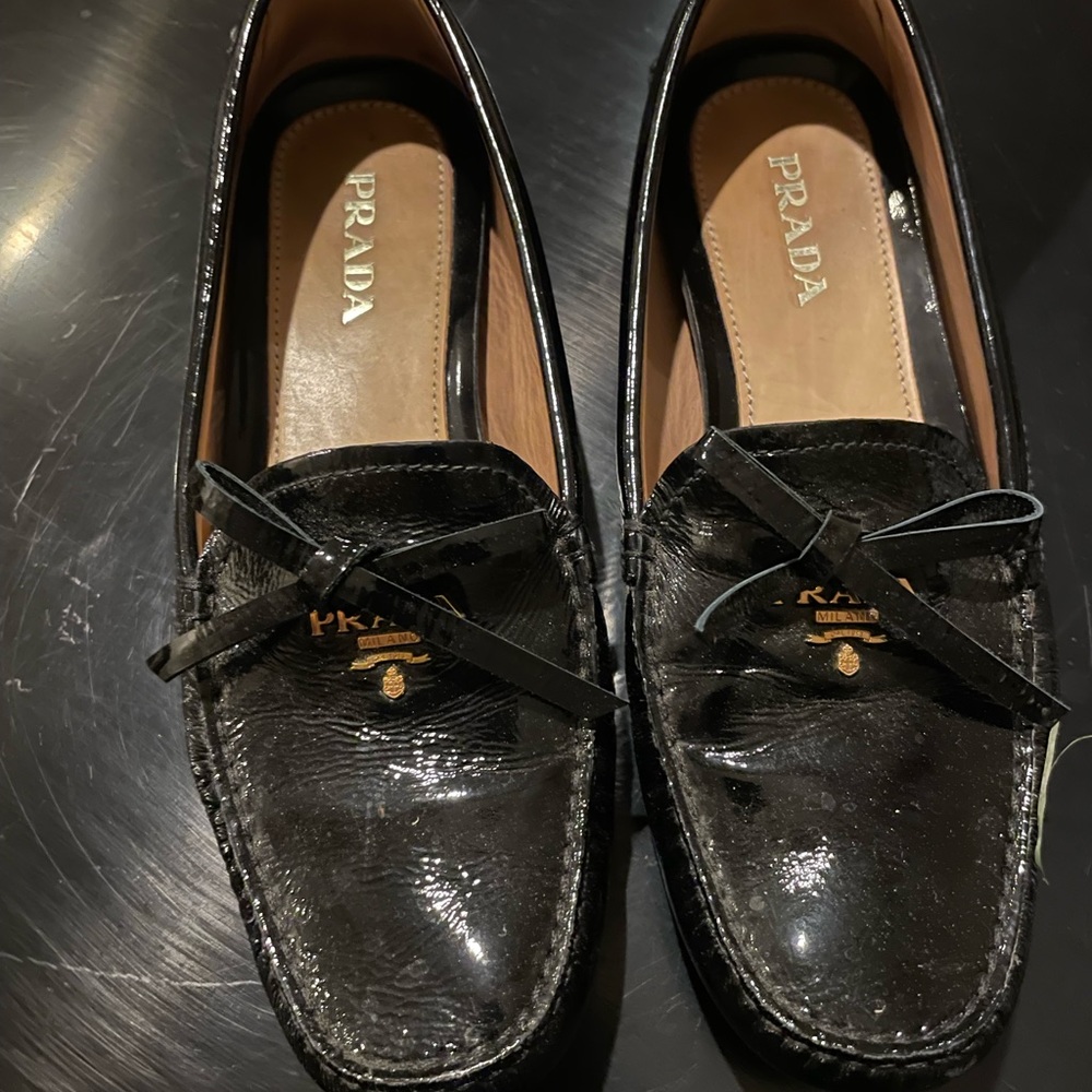 Prada black and gold patent leather driver shoes
